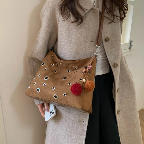 Retro Faux Suede Grommet Hobo Bag Women Large Capacity Shoulder Crossbody Bag With Optional Plush Ball Pendant Charm
