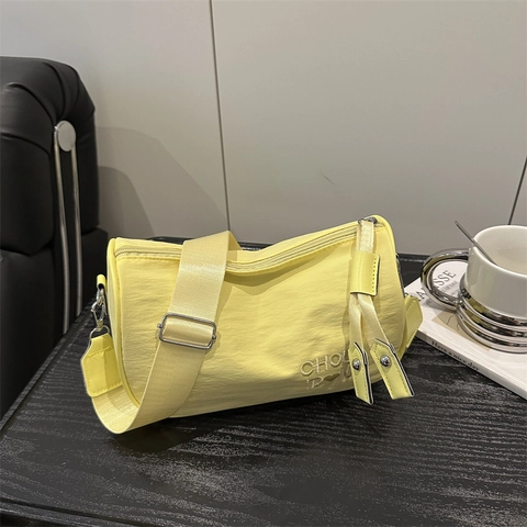 Women Lightweight Nylon Crossbody Pillow Bag Casual Solid Color Handbag With Wide Adjustable Shoulder Strap And Woven Pendant