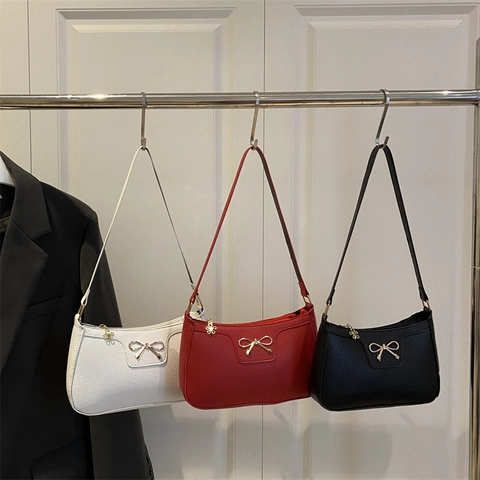 Women Fashion Bowknot Underarm Baguette Bag Lychee Pattern PU Leather Solid Color Shoulder Bag With Flower Metal Pendant