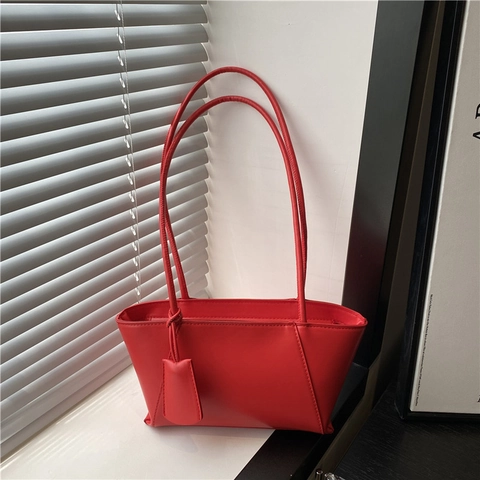 Women Minimalist PU Leather Underarm Bag Large Capacity Trapezoid Shoulder Bag With Charm Strap Solid Color Commuter Tote Bag