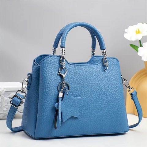 Dames Handtas PU Leer Litchi Korrel Grote Capaciteit Tote Schoudertas Met Ster Hanger Zilveren Hardware Verstelbare Riem