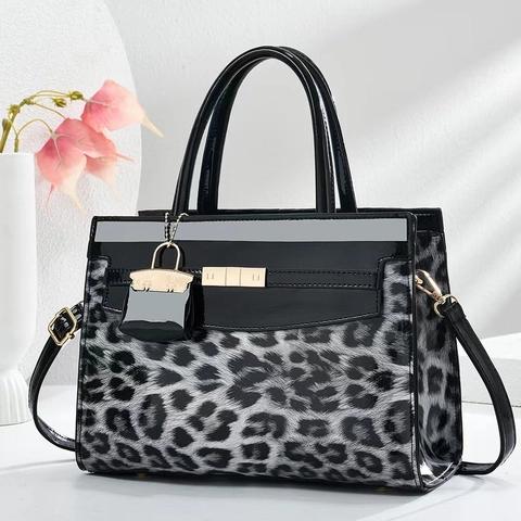 Sac à Main en Cuir PU Imprimé Léopard pour Femmes Sac à Épaule Grande Capacité avec Pendentif Mini Sac