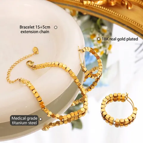 Bijoux En Acier Titane Plaqué Or 18K Bracelet Boucles D Oreilles Femmes Perles Cubes Mobiles Style Rétro