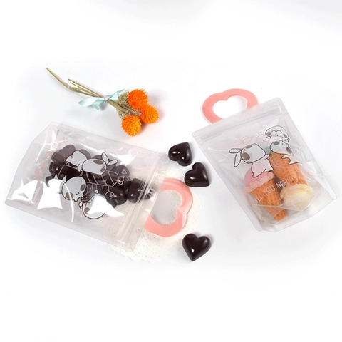 Sacs d'Emballage Cadeau Rose de Style Coréen Avec Poignée en Cœur en Plastique PET Auto-scellants pour Bonbons