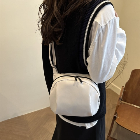 Women Crossbody Bag Lightweight Nylon Half Moon Dumpling Bag Minimalist Solid Color Zipper Closure Adjustable Strap Casual