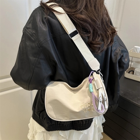 Women Lightweight Nylon Crossbody Pillow Bag Casual Solid Color Handbag With Wide Adjustable Shoulder Strap And Woven Pendant