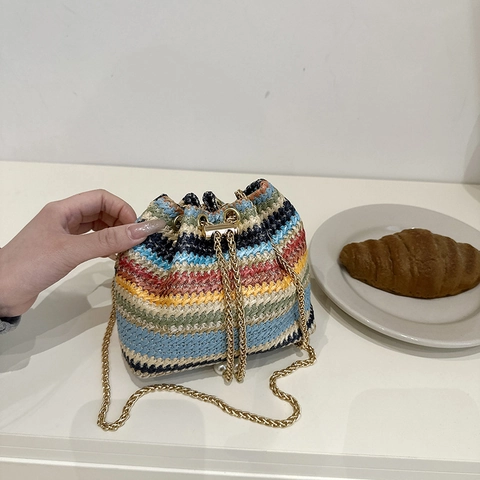 Women Woven Straw Bucket Bag Fashion Colorful Striped Crossbody Bag With Metal Chain And Pearl Drawstring Summer Beach Shoulder Bag