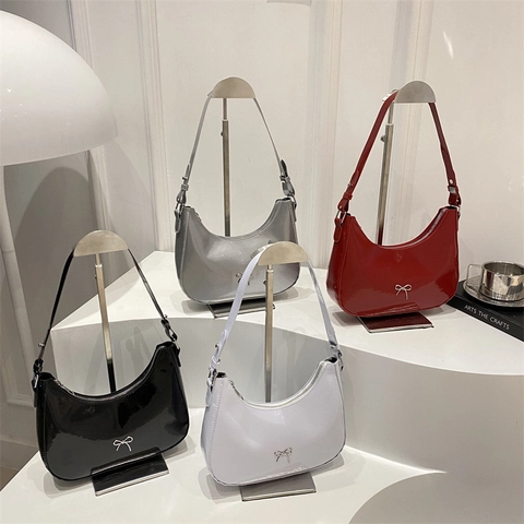 Dames Mode PU Lakleer Halvemaan Schoudertas Met Metalen Strik Glanzende Hobo Bag Eenvoudige Dagelijkse Tas