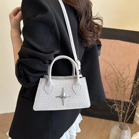 Bolso De Mano Para Mujer Bolso Bandolera Cuero PU Textura Tejida Hebilla De Estrella Plateada Bolso De Hombro Trapecio Minimalista