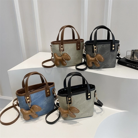 Women PU Leather Bucket Bag Streetwear Letter Print Contrast Stitching Crossbody Shoulder Bag With Dog Charm Daily Casual Handbag
