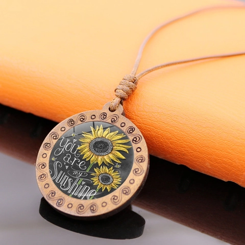 Collier Pendentif Tournesol en Bois Vintage Inscription You Are My Sunshine Corde Cirée Ajustable Chaîne Longue de Pull Cadeau Boho