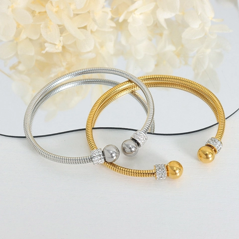 Bracciale Aperto Minimalista Con Texture A Osso Di Serpente Per Donna In Acciaio Al Titanio Placcato Oro Con Strass