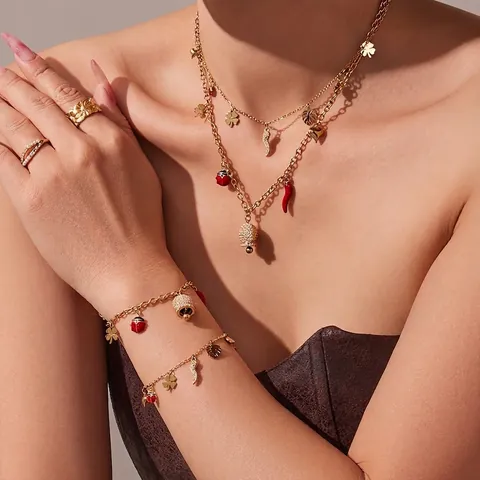 Bijoux En Acier Inoxydable Collier Bracelet Plaqué Or Piment Coccinelle Cloche Trèfle Cœur Charmes Pour Femmes