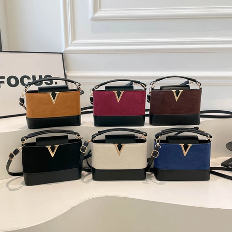 Bolso Cubo Mujer Cuero PU Mate Diseño Contraste Textura Gamuza Hombro Cruzado Bolso Mano Con Logo Metal V Moda