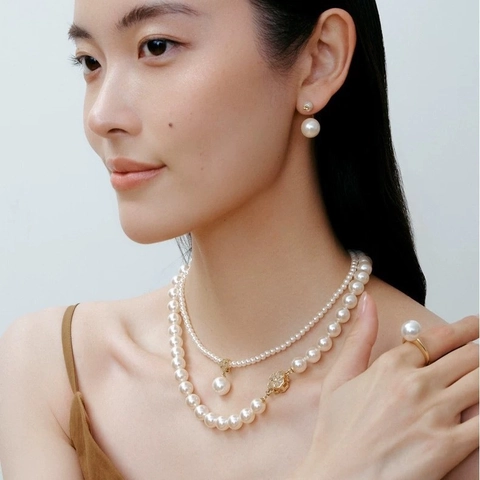 Elegante Collana Di Künstliche Perle Tonde Rame Placcato Oro 18K Ciondolo Quadrifoglio Gioielli In Stile Vintage Per Donna