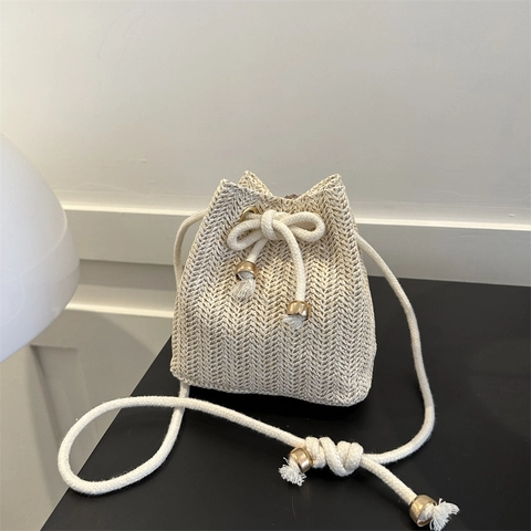 Women's Summer Straw Woven Bucket Bag Small Drawstring Shoulder Crossbody Bag For Beach Vacation With Cotton Rope Strap