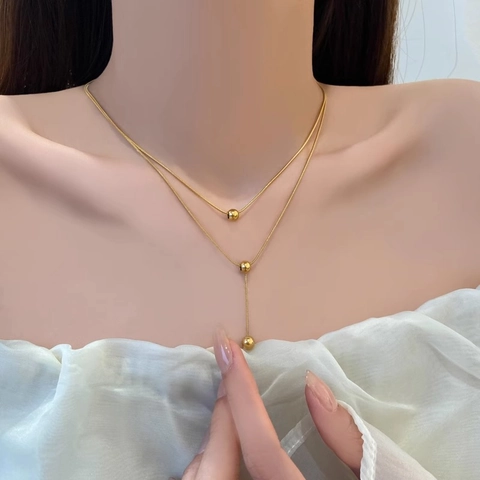 Collier Double Couche en Acier Titane avec Perles Chaîne Serpent Minimaliste Tassel en Forme de Y pour Femmes