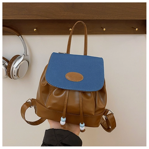 Vintage College Style Women Mini Backpack PU Leather Contrast Color Drawstring Flap Bag With Plush Monster Pendant Daypack