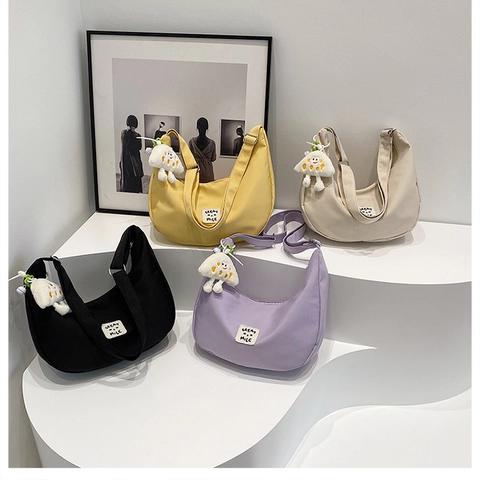 Women Nylon Half Moon Shoulder Bag Lightweight Casual Crossbody Bag With Plush Charm Adjustable Solid Color Hobo Bag For Daily Use