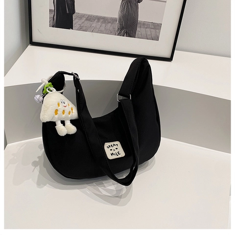 Women Nylon Half Moon Shoulder Bag Lightweight Casual Crossbody Bag With Plush Charm Adjustable Solid Color Hobo Bag For Daily Use