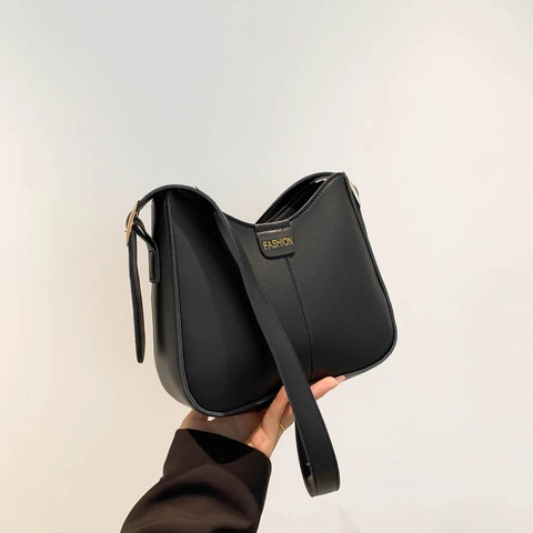 Women PU Leather Shoulder Bag Crescent Half Moon Minimalist Chic Underarm Bag With Plush Toy Pendant Solid Color