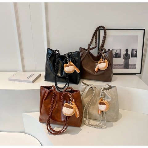 Women Large Capacity PU Leather Tote Bag Retro Casual Shoulder Bag With Woven Strap Contrast Stitching And Plush Pendant