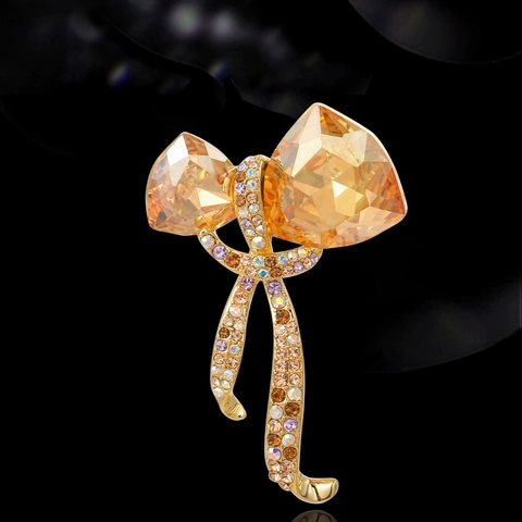 Elegant Bowknot Brooch Pin For Women With Large Amber Crystal And Multifaceted Multi Color Rhinestone Vintage Alloy Corsage