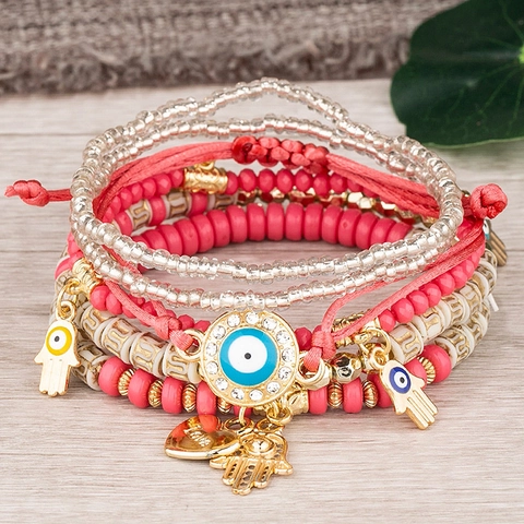 Bracelet Bohème Multicouche en Perles pour Femmes Alliage Mauvais Œil Main de Fatima Cœur Charm Élastique Bijoux Ethniques
