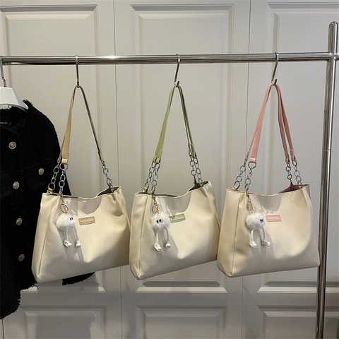 Women Large Capacity PU Leather Tote Bag With Metal Chain Strap Fashion Minimalist Shoulder Bag With Plush Monster Pendant