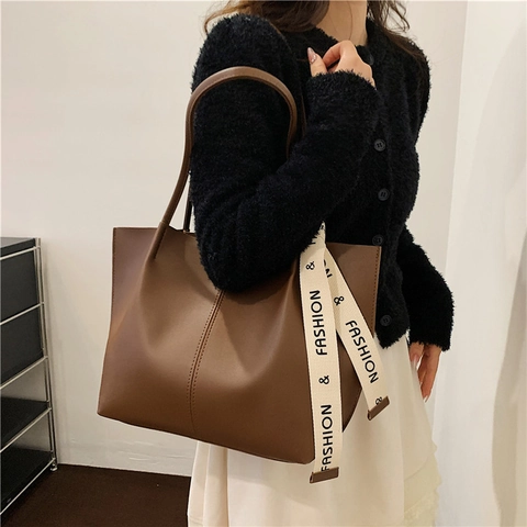 Damen Vintage PU Leder Tote Bag Große Kapazität Schultertasche Mit Mode Buchstabenband Für Den Täglichen Pendelverkehr