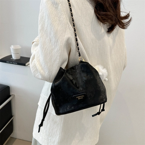 Women Drawstring Bucket Bag Fashion Small Handbag With Metal Chain Strap And Triangle Decoration
