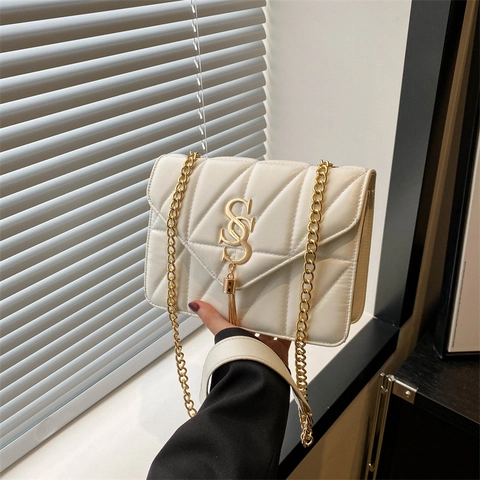 Bolso De Hombro Moda Mujer Cuero PU Acolchado Bandolera Con Cadena Dorada Borla Logo Metal Diseño Elegante