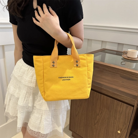 Bolso Tote De Lona Con Estampado De Letras Bolso De Mano Con Decoración De Remaches Casual Para Mujer Estilo Simple