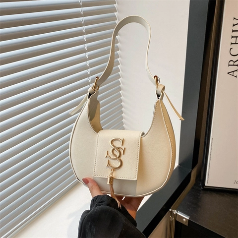 Bolso De Axila Creciente Mujeres Cuero PU Media Luna Bolso De Hombro Logo Metal Borla Moda Retro Bolso Hobo Pequeño