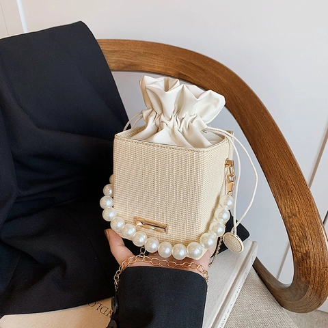 Women Woven Bucket Bag With Artificial Pearl Handle And Gold Chain Strap Square Cube Crossbody Handbag Drawstring Closure Small