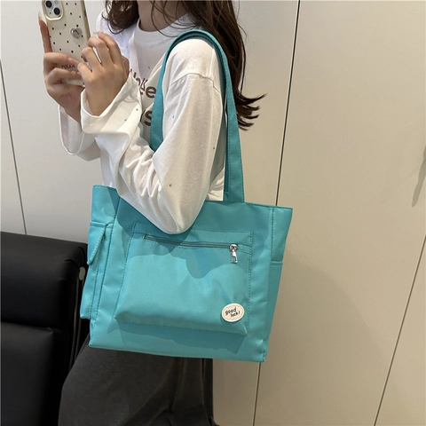 Women Large Capacity Canvas Tote Bag Minimalist Shoulder Bag Casual Commuter Handbag Zipper Front Pocket Good Luck Patch