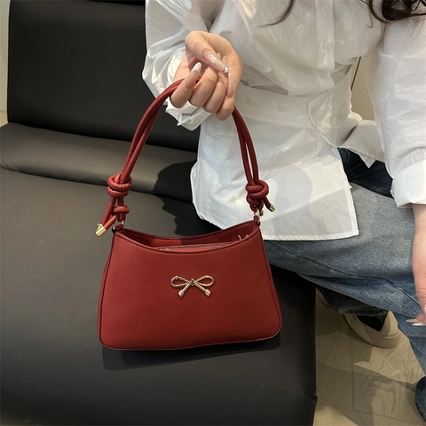 Women PU Leather Underarm Shoulder Bag With Gold Bowknot Buckle And Knotted Strap Elegant Fashion Solid Color