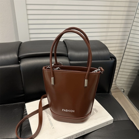 Bolso de Cubo de Cuero PU de Moda para Mujer Minimalista Color Sólido Bolso de Hombro Diario Viaje Mano Con Diseño Letras