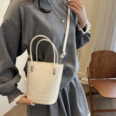 Bolso de Cubo de Cuero PU de Moda para Mujer Minimalista Color Sólido Bolso de Hombro Diario Viaje Mano Con Diseño Letras