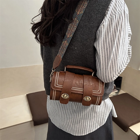 Vintage PU Leather Cylinder Crossbody Bag For Women Contrast Stitching Rivet Handbag With Ethnic Patterned Wide Strap Dual Turn Lock