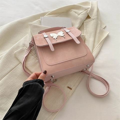 Mini Mochila de Cuero PU para Mujer Moda Elegante Mariposa de Metal Pequeño Bolso de Hombro Cruzado Bolso de Mano Tendencia