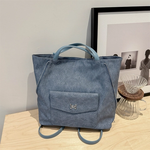 Sac Fourre-tout Femme Grande Capacité Sac à Dos Vintage en Cuir PU Texture Lavée Logo Papillon Sac à Bandoulière Casual