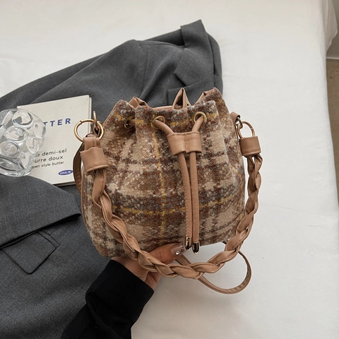 Vintage Plaid Woolen Bucket Bag For Women Retro Drawstring Crossbody Shoulder Bag With Woven Handle And Plush Pendant