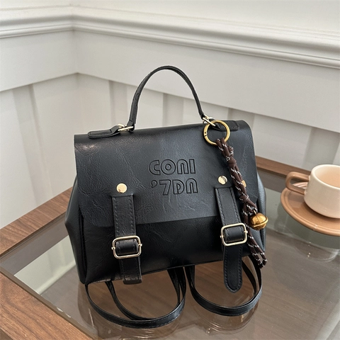 Mochila de Cuero PU Estilo Universitario Vintage para Mujer Gran Capacidad Color Sólido Bolso Bandolera con Solapa y Colgante