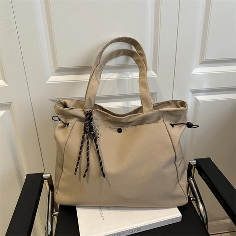 Women Large Capacity Nylon Tote Bag Urban Minimalist Casual Shoulder Bag With Drawstring Side Detail And Pendant For Office School Daily Use
