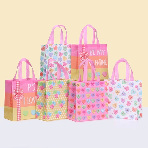 Valentine's Day Heart Pattern Non-Woven Gift Bag With Bow Waterproof Laminated Party Favor Handbag For Candy Treats Wedding Birthday Party
