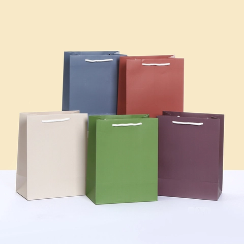 Minimalist Matte White Cardboard Handheld Paper Gift Bag With Cotton Rope Handle Solid Color Packaging Bag For Wedding Party Shopping