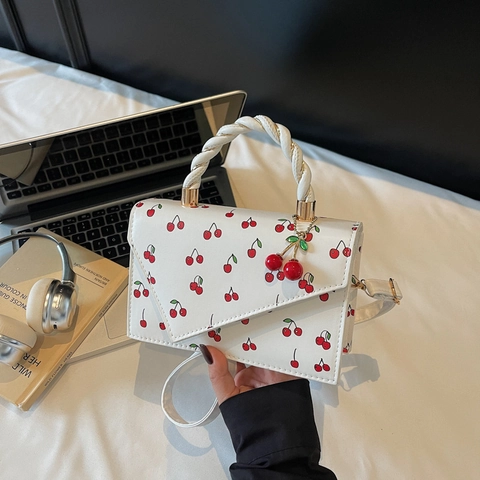 Damen Süße Kirschdruck PU Leder Umhängetasche Mode Kleine Quadratische Handtasche Mit Geflochtenem Griff Und Frucht Anhänger