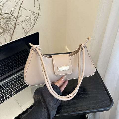 Bolso bajo el brazo de cuero PU minimalista de estilo francés para mujer Bolso de hombro de color sólido con hebilla de metal y nudo
