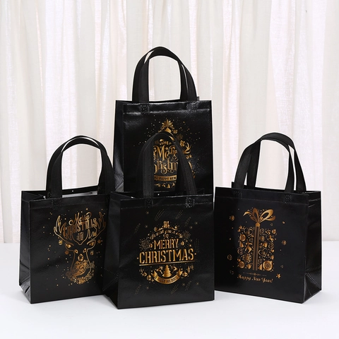 Weihnachts-Geschenktüten Vliesstoff Goldprägung Rentier Weihnachtsbaum Muster Feiertags-Party-Geschenkbeutel Schwarz Gold Elegante Tragetaschen